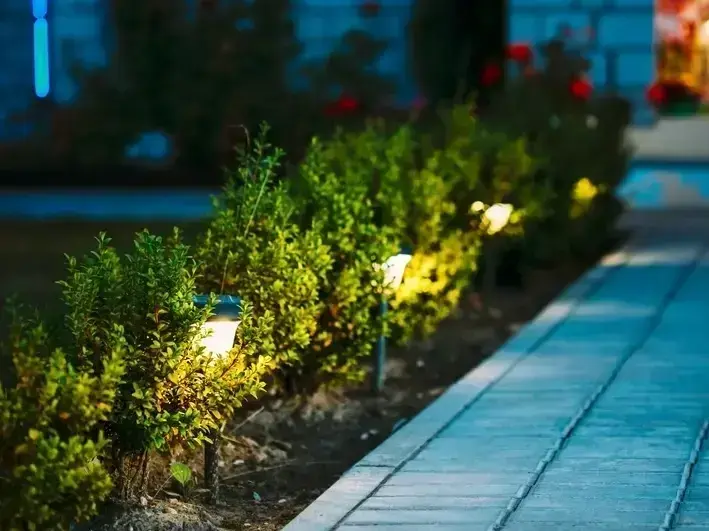 retaining wall and drainage fix on sloped Covington Heights yard after winter rain